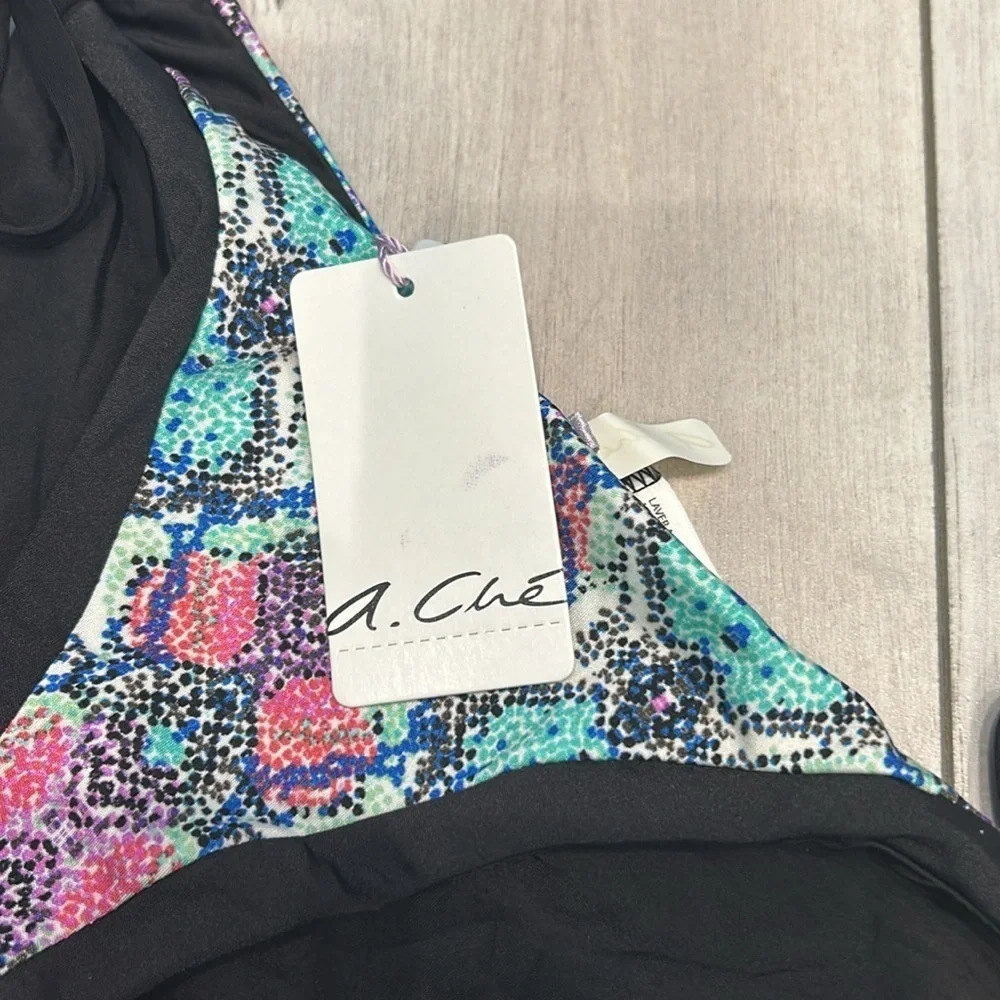 A. Che side tie swim bikini bottom snake print size small